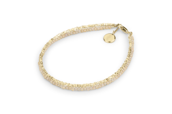 Glissé - náramek s fragmenty pozlaceného stříbra a zirkony, zasvěcený touze po PROBUZENÍ